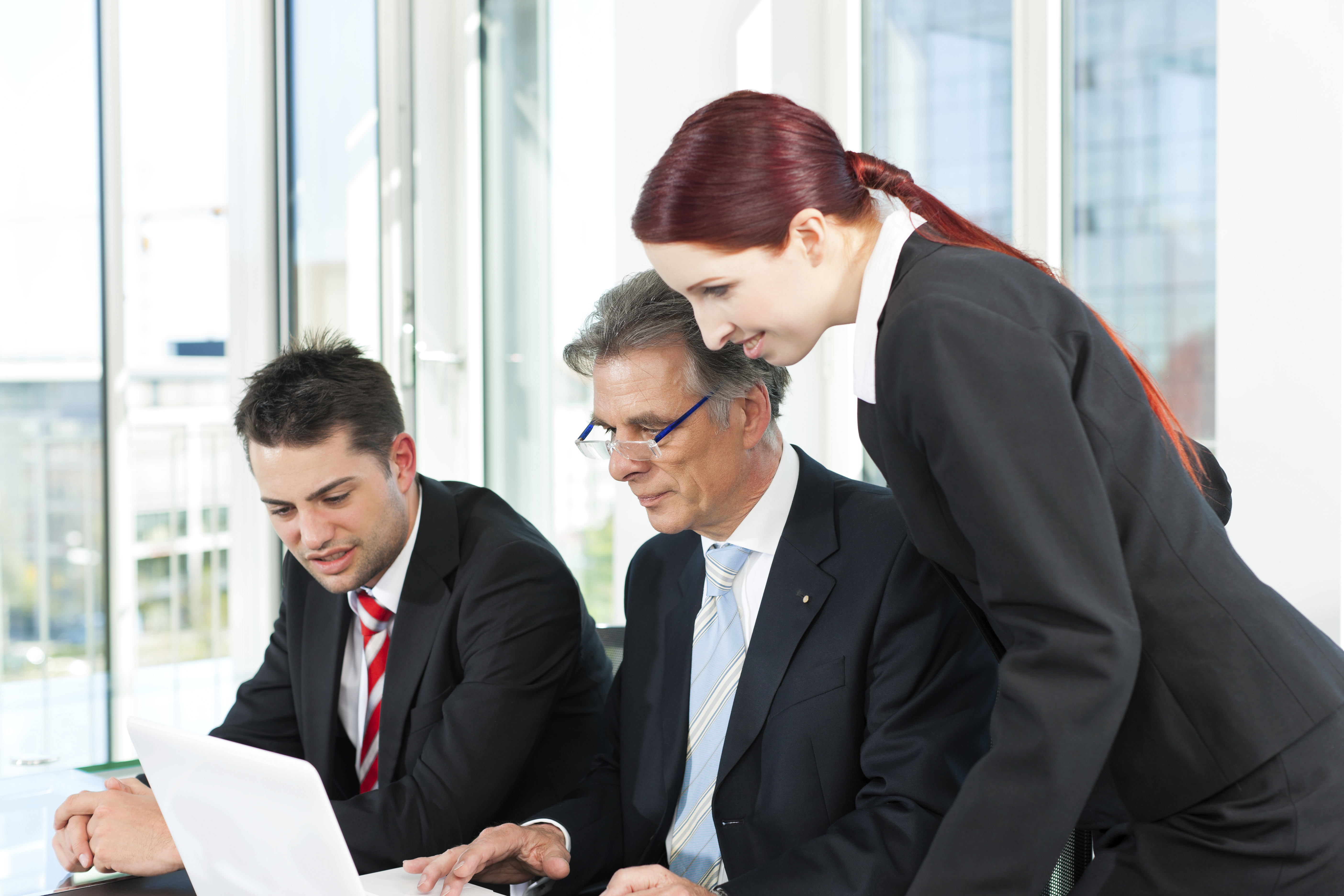 Business people - team meeting in an office